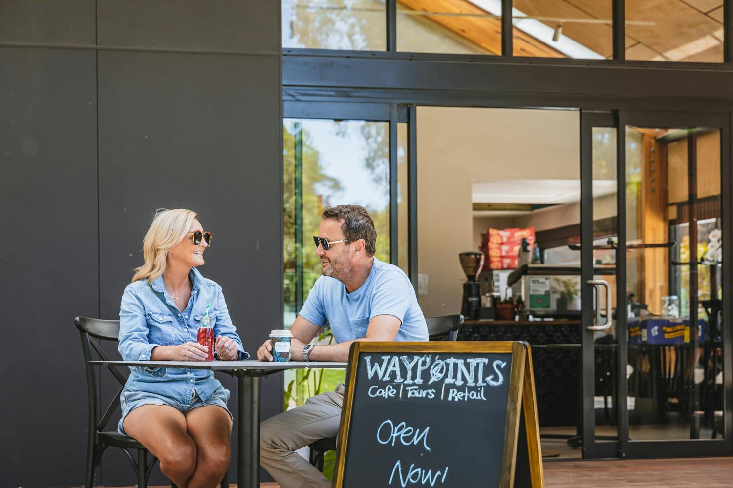 Customers enjoy a drink in front of Waypoints Cafe in Dwellingup
